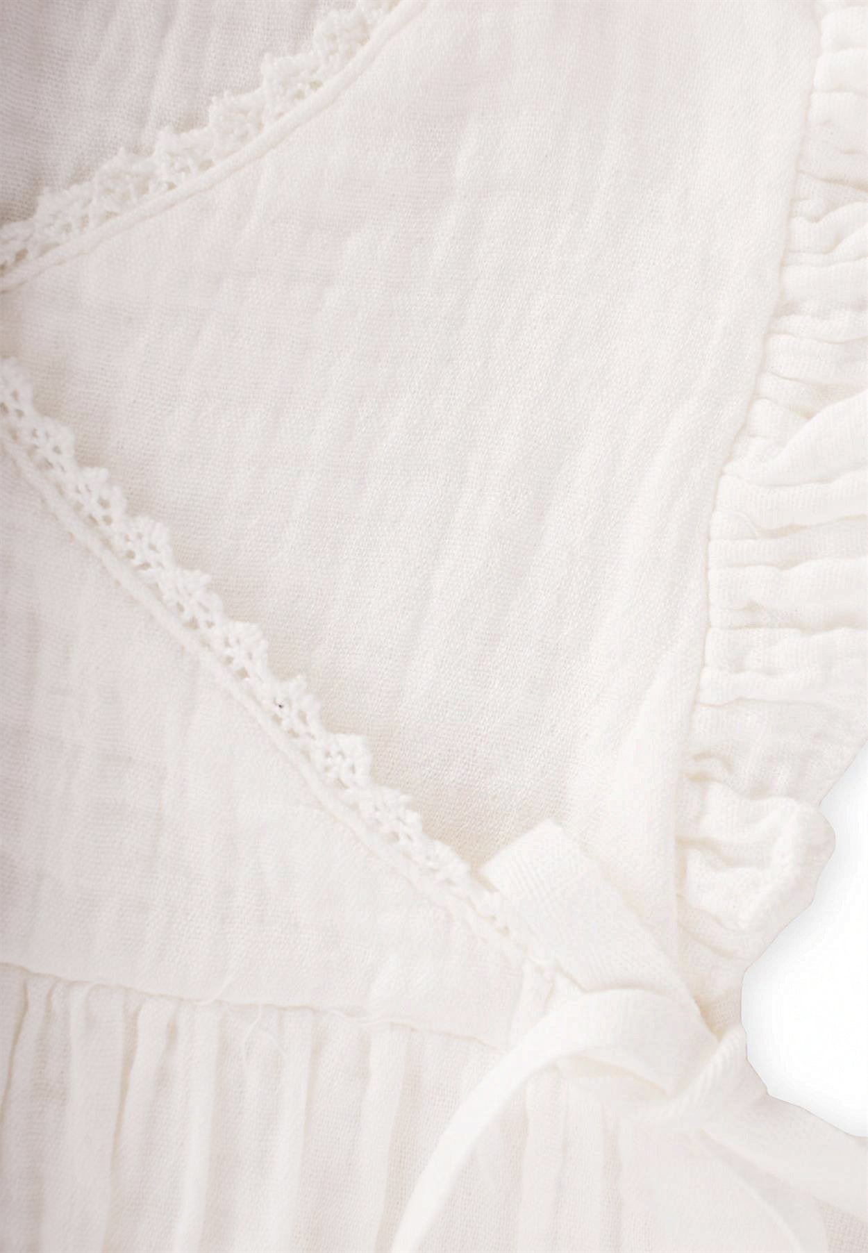 Organic muslin jumpsuit with lace