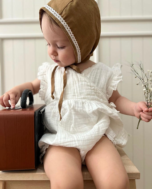 Organic muslin jumpsuit with lace
