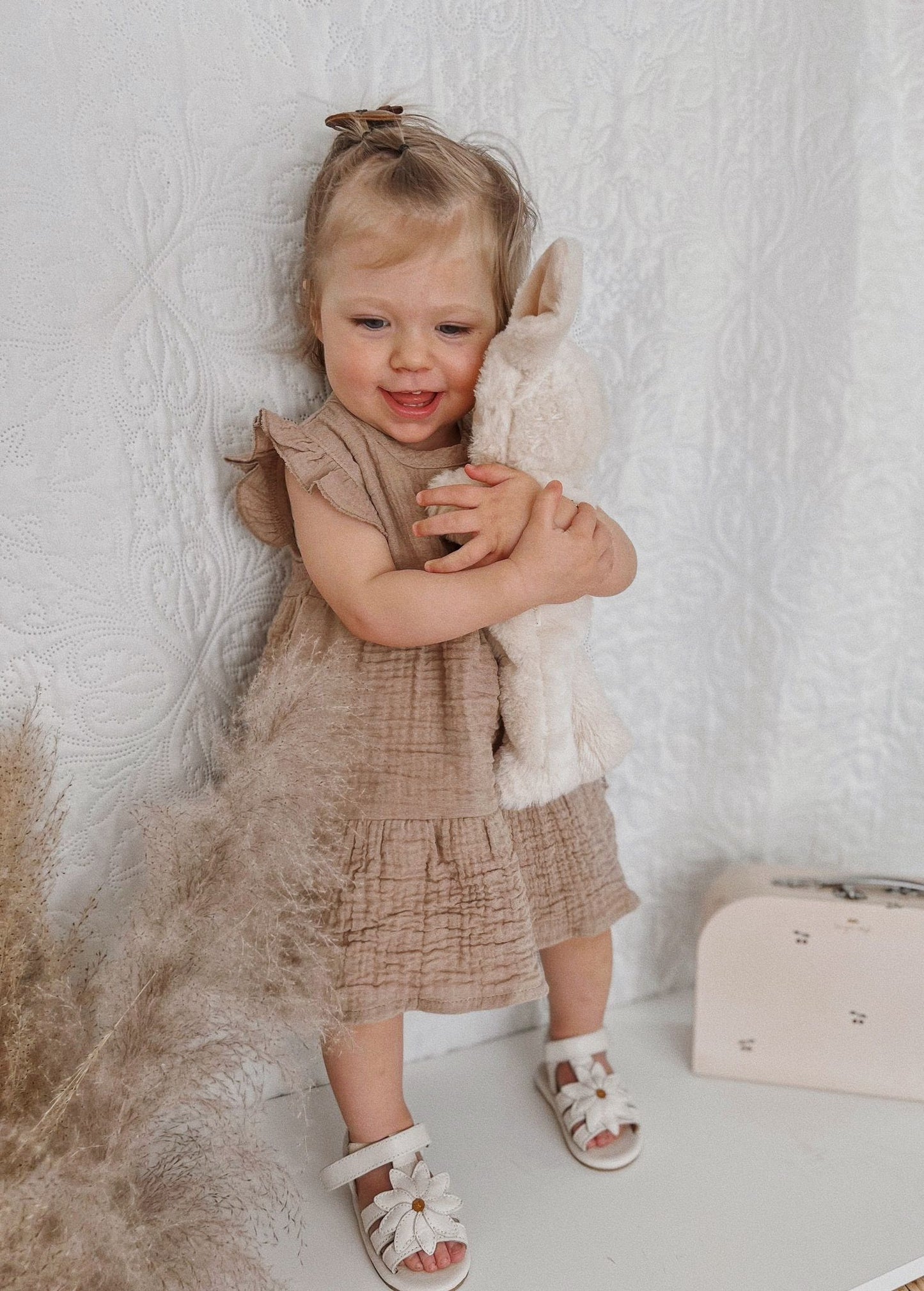 Kleid aus Musselin mit Rüschen 