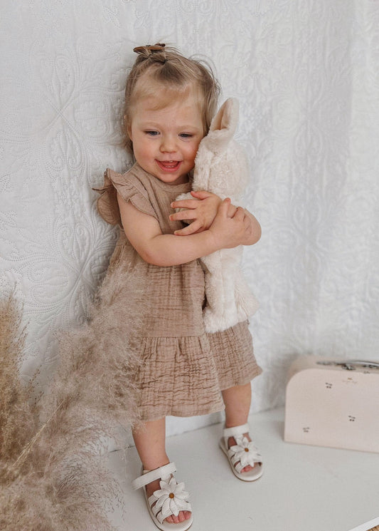Muslin dress with ruffles 